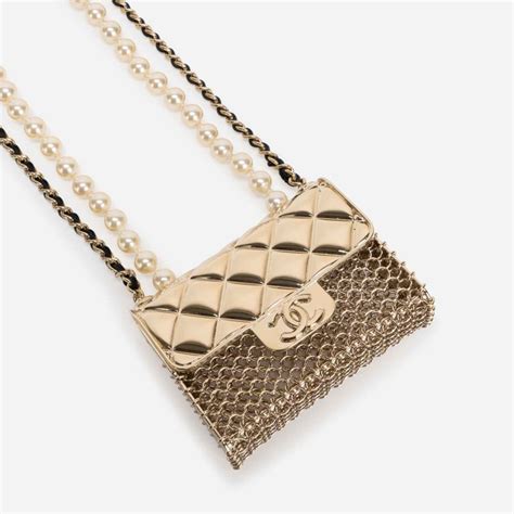 chanel timeless micro necklace|Chanel necklace price.